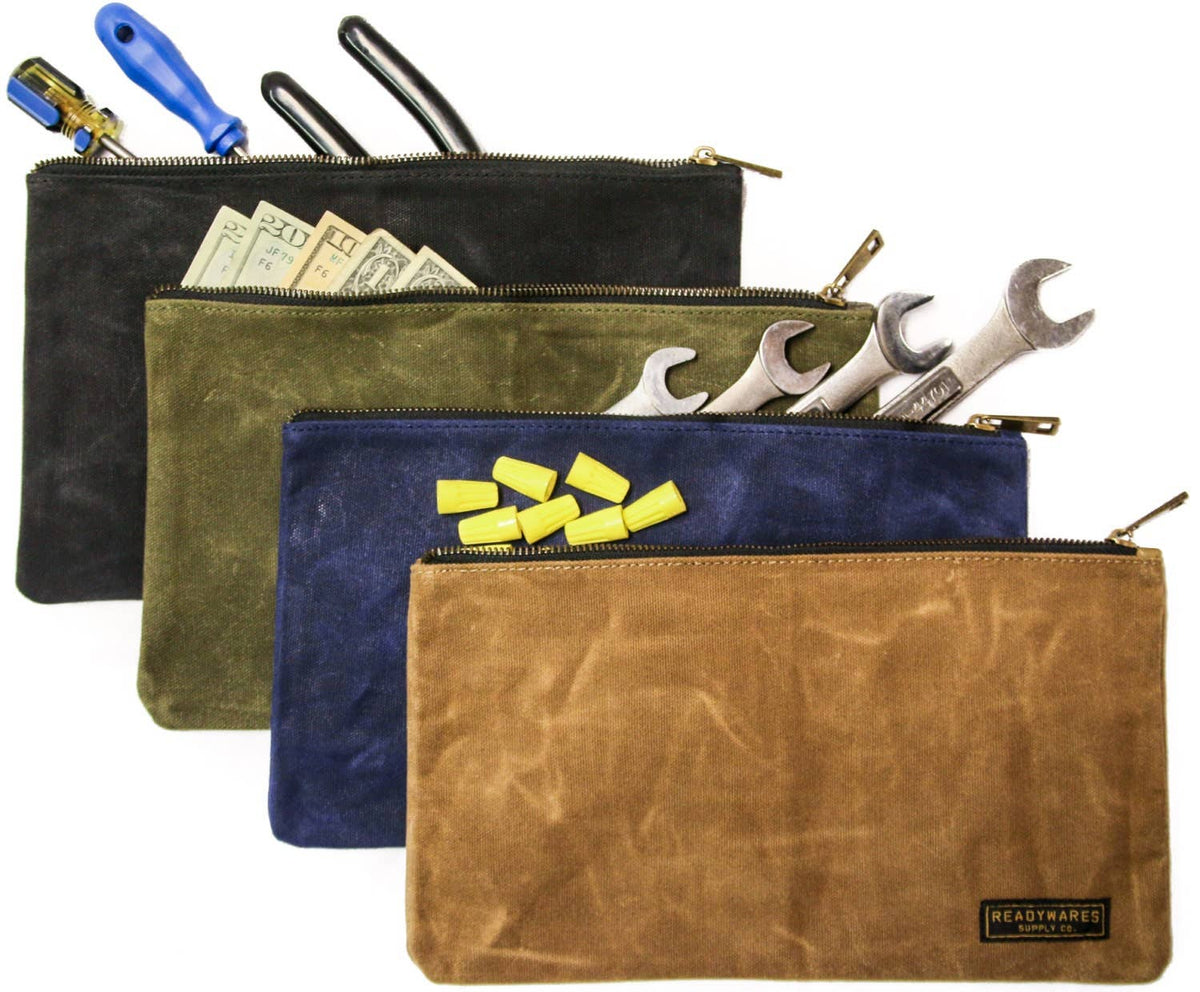Black, olive, navy and tan zipper tool bags packed with cash, tools and wire nuts on a white background