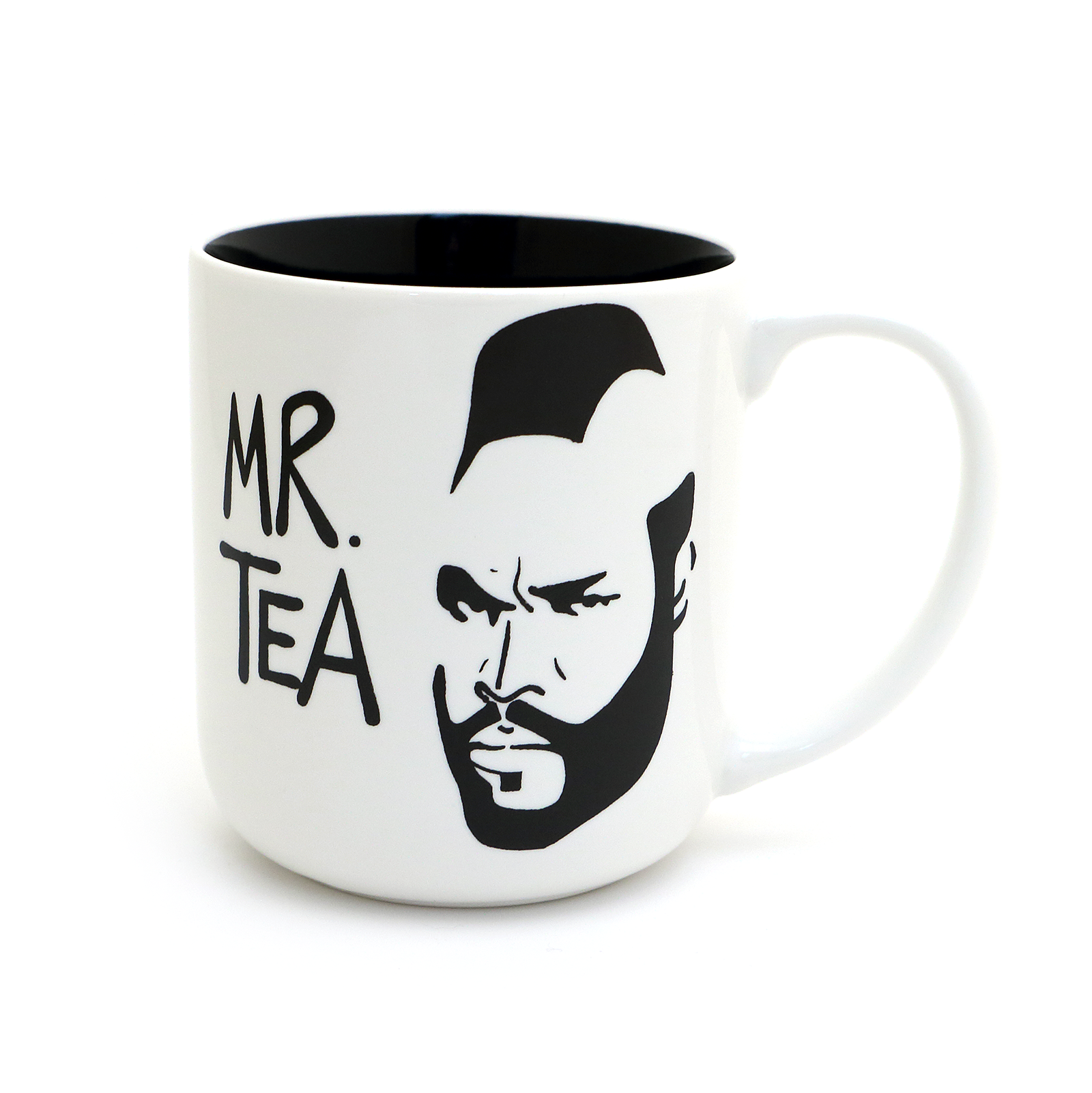 White mug with black interior, black and white graphic of a face, and 'MR. TEA' text on a white background