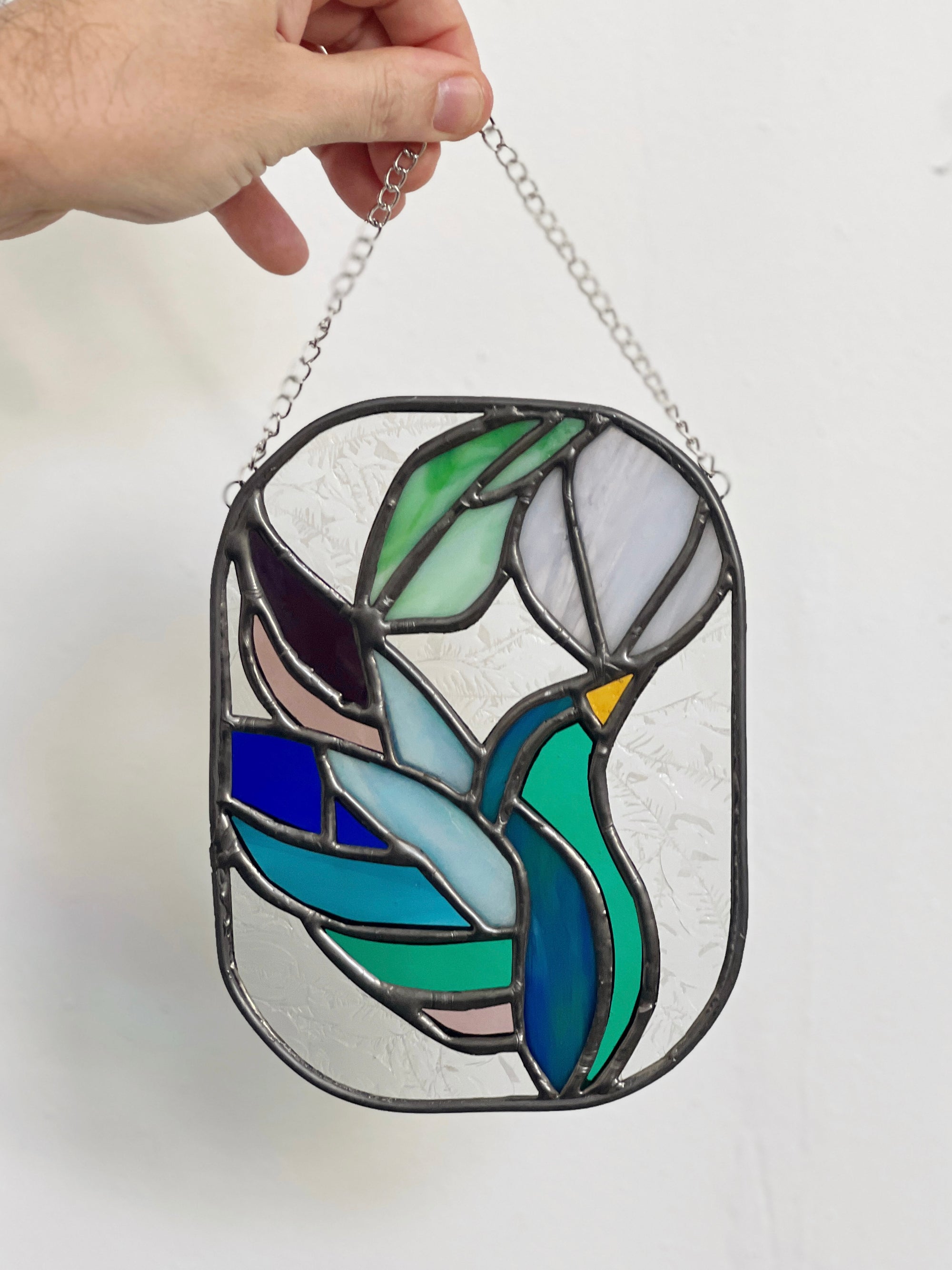 Handcrafted stained glass bird suncatcher. Flamingo, hummingbird &amp; owl designs. Unique window decor &amp; bird lover gift. Perfect for sunny windows.